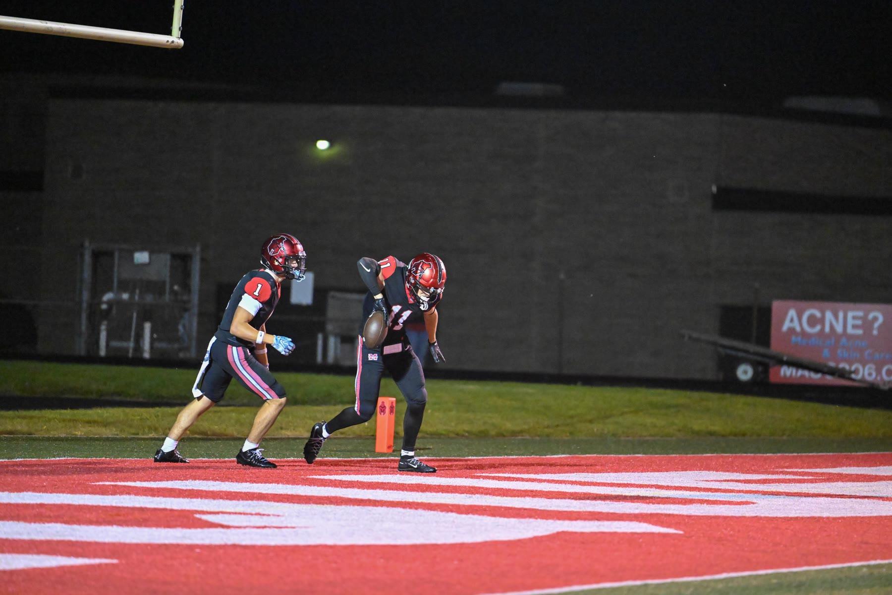 Marquette celebrates in the end zone after Blackburn’s fourth-quarter touchdown catch.